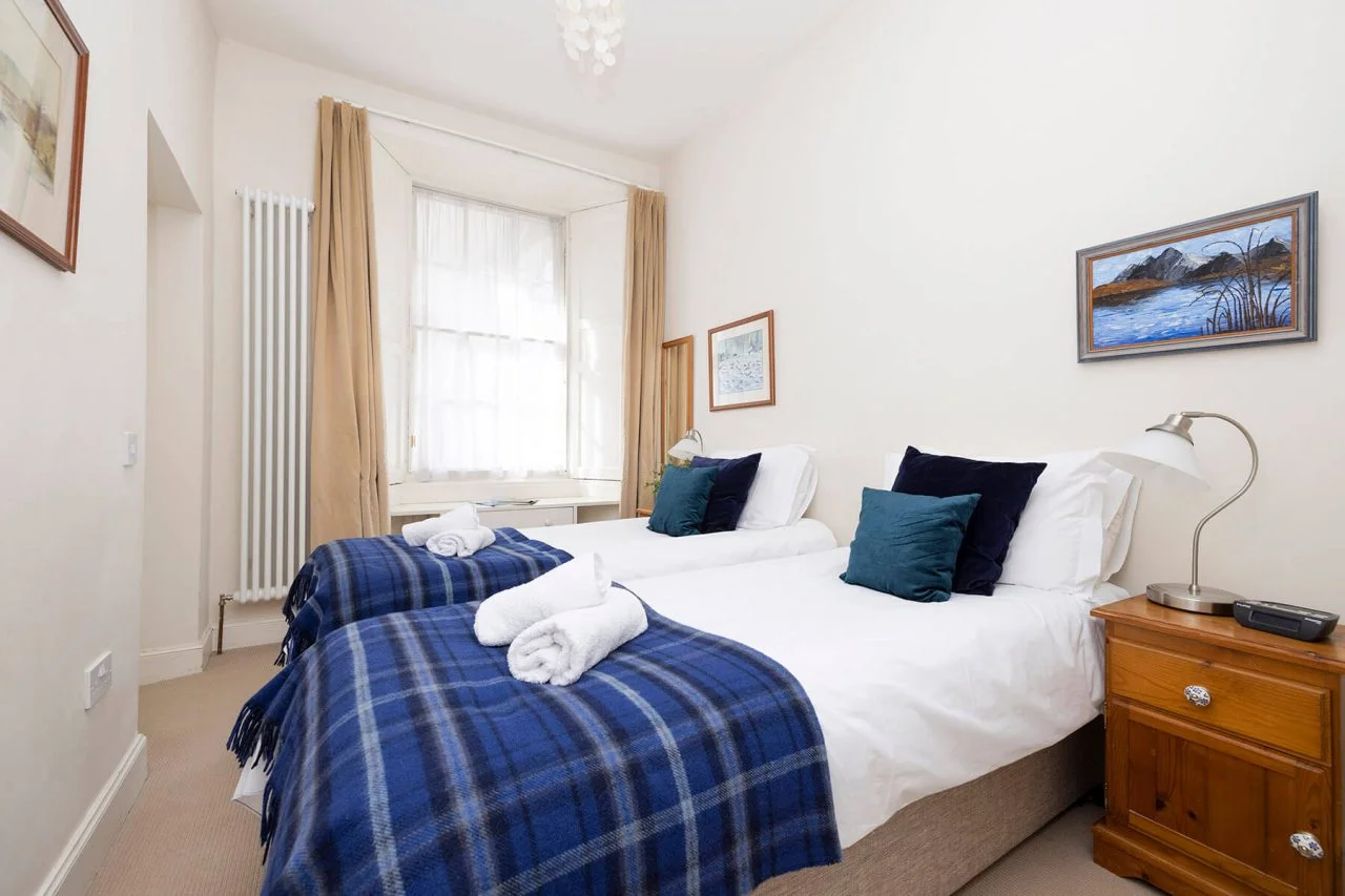 Two single beds in Dundas Apartment